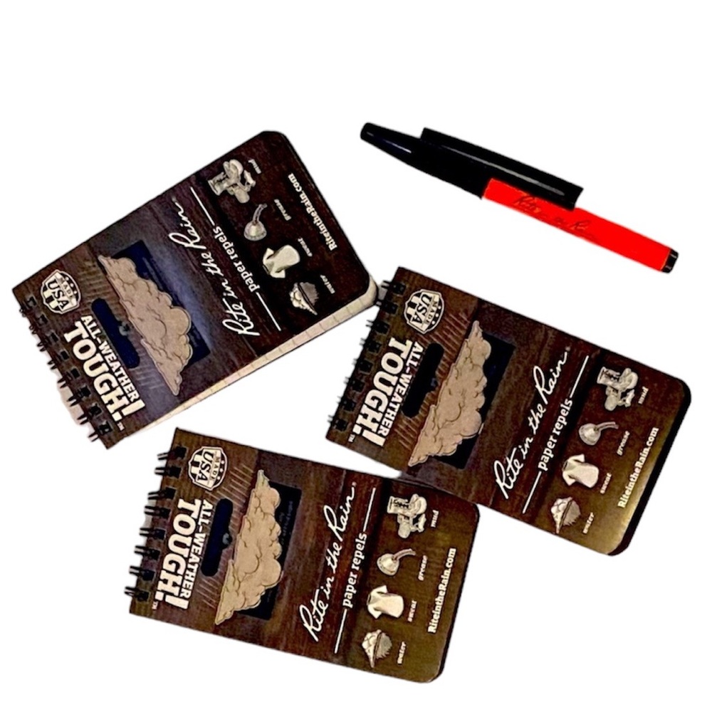 2X Rite in the Rain pens and a set of 3 note pads.
